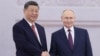 Голова Китаю Сі Цзіньпін (л) і президент РФ Володимир Путін, Москва, 8 травня 2025 року