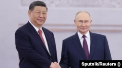 Сі Цзіньпін і Ўладзімір Пуцін