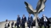 Croatian Prime Minister Andrej Plenkafterovic (left), President Zoran Milanovic (center), and parliament speaker Gordan Jandrokovic leave the flower-shaped Jasenovac monument after a ceremony in tribute to the victims killed in the concentration camp during World War II on April 22, 2020.