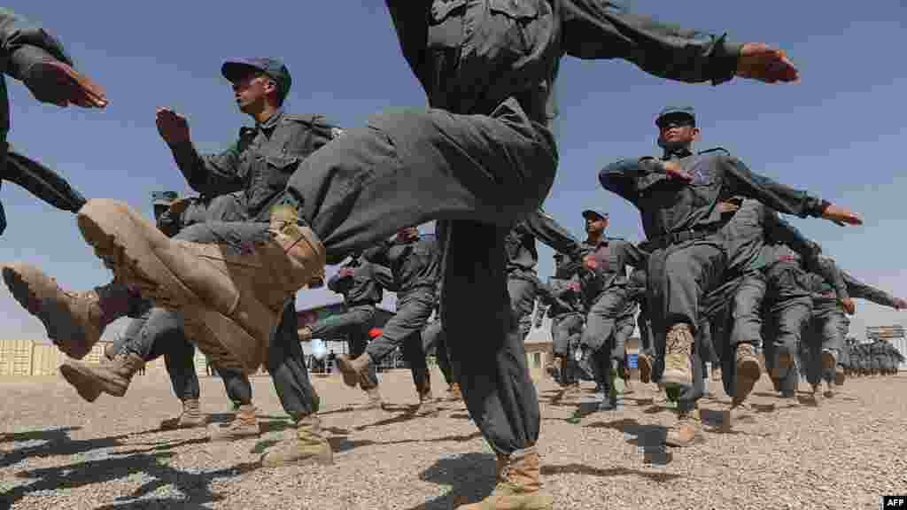 Afghan National Police march during a graduation ceremony at a police training center in Herat. (AFP/Aref Karimi)