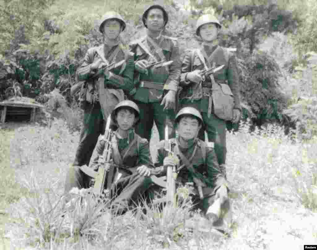 Monique's brother, Francisco (back row, center), at a military-training exercise in Pyongyang in 1990.