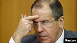 Russian Foreign Minister Sergei Lavrov gestures during a news conference in Moscow on January 18.