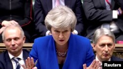 Ұлыбритания премьер-министрі Тереза Мэй парламенттегі өзіне сенім білдіру мәселесіне дауыс беру кезінде сөйлеп тұр. Лондон, 16 қаңтар 2019 жыл.