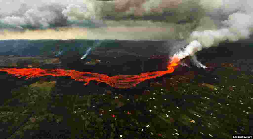Lava from the Kilauea volcano flows in and around Pahoa, Hawaii. (AP/L.E. Baskow)