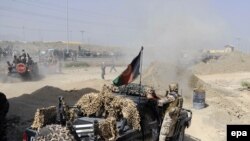 Afghan security forces take positions after militants attacked the Kabul International Airport (file photo).