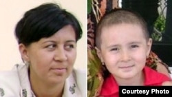 Feruza Jumanova (left), the wife of jailed Uzbek journalist Dilmurod Sayyid, and his daughter Rukhshona