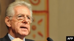 Italy's freshly nominated prime minister, Mario Monti, speaks to the press during consultations to form a new government in Rome on November 15.