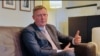 Latvian Defense Minister Raivis Melnis speaks to RFE/RL in Washington on September 30. 