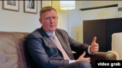 Latvian Defense Minister Raivis Melnis speaks to RFE/RL in Washington on September 30. 