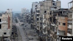 Пошкоджені будівлі сирійського Хомса, 27 січня 2014 року