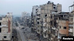 Pamje nga një pjesë e qytetit Homs e shkatërruar nga lufta në Siri