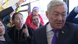 Kazakh Mothers Protest At Forum, Bused Away To Meet Mayor