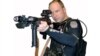 32 жаштагы Андерс Беринг Брейвик (Anders Behring Breivik) бир китептеги сүрөттө.