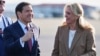 Iceland's foreign minister, Thorgerour Katrin Gunnarsdottir (right), welcomes US Secretary of State Marco Rubio at Keflavik Airport on October 6. 
