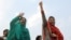 Kulsoom (left) and Maryam Nawaz attend an election campaign meeting in Lahore in May 2013. 