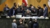 Iranian parliament speaker Ali Larijani, seated at center, speaks with a group of lawmakers in a session of parliament in Tehran, Iran, on Dec 02, 2018.