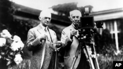 Амэрыканскія вынаходнікі Джордж Істмэн і Томас Эдысан, 1919