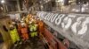 Workers celebrate after finishing the construction of the Nord Stream 2 gas pipeline under the Baltic Sea.