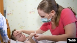 Заболеваемость ОРВИ и гриппом в некоторых регионах России превышает эпидемический порог в разы .