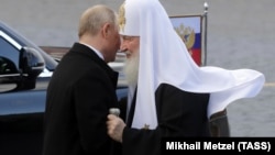 Президент России Владимир Путин и патриарх Кирилл, 4 ноября 2018 года