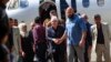 Martin Griffiths (C), the UN special envoy for Yemen, walks away from his plane upon his arrival at Sanaa international airport on November 21, 2018. (Photo by MOHAMMED HUWAIS / AFP)