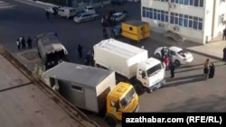 Trucks installing gas meters in Ashgabat on November 7.
