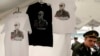 T-shirts, displaying images of Russian President Vladimir Putin go on sale at a canteen during an event entitled &quot;Innovations Day,&quot; which was organized by Russia&#39;s Western military command at the Levashovo airbase outside St. Petersburg on June 6. (Reuters/Alexander Demianchuk)