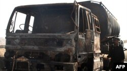 One of the burned-out tankers from a mid-October attack on NATO supplies near Quetta, Pakistan