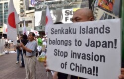 Манифестация японских националистов в Токио в связи с притязаниями КНР на острова Сенкаку. 2012 год