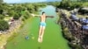 Kosovo: Competitors plunged 22 meters from the historical Fshejt Bridge at an annual high-diving contest near the Kosovo village of Xerxe.