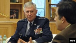 Georgian President Mikheil Saakashvili (right) with the commander of U.S. air forces in Europe, General Roger Brady, in Tbilisi on December 7