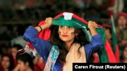 Supporters of Imran Khan's Pakistan Tehreek-e Insaaf (PTI) during a rally in Islamabad on July 30.