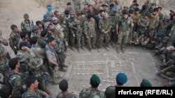 FILE: An Afghan National Army unit prepares an offensive in Kunduz Province.