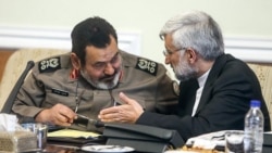 Saeed Jalili (right) at a meeting with an Iranian military officer (file photo)