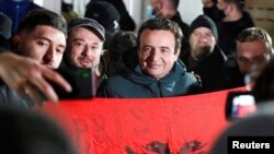 Vetevendosje party leader Albin Kurti with supporters after preliminary results of parliamentary elections in Kosovo showed his party far ahead