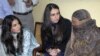 The daughter and wife of the governor of Punjab Province speak to Aasia Bibi (right), who has been sentenced to death for blasphemy 