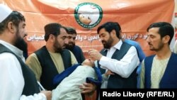 FILE: A polio vaccination campaign in Helmand in late September.