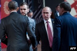 Последняя встреча Барака Обамы в качестве президента США с Владимиром Путиным. Перу, ноябрь 2016 года