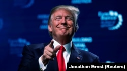 U.S. President Donald Trump concludes his remarks at the American Farm Bureau Federation convention in Nashville, Tennessee, January 8, 2018