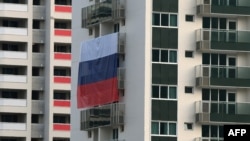 Российский флаг в Олимпийской деревне в Рио-де-Жанейро