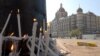 Candles outside the Taj Mahal Hotel, site of one of the bloodiest attacks