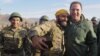 Armenia -- An Armenian army reservist takes a selfie with Defense Minister Davit Tonoyan (R) during a military exercise, September 30, 2019.