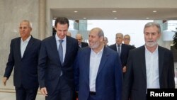 دیدار بشار اسد و خلیل الحیه، رئیس دفتر سیاسی حماس در دمشق در روز چهارشنبه ۲۷ مهر