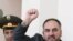 Armenia -- Miasnik Malkhasian, one of the arrested Armenian opposition figures, greets supporters attending his trial on June 16, 2009.