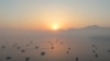 A drone view shows vessels in the Strait of Hormuz as seen on from Musandam, Oman, June 15, 2026.