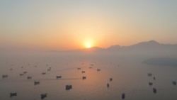 A drone view shows vessels in the Strait of Hormuz as seen on from Musandam, Oman, June 15, 2026.