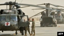 U.S. Blackhawk helicopters before a mission at Kandahar Airfield. (file photo)