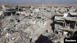 Pamje nga një lagje e Damaskut në Siri e shkatërruar nga sulmet ajrore