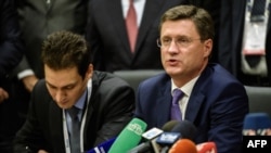 Russian Energy Minister Aleksandr Novak (right) speaks during a press conference during the 23rd World Energy Congress on October 12.