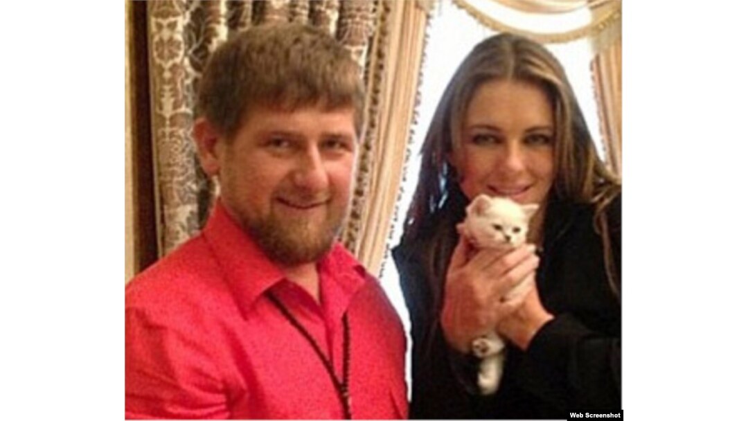 Kadyrov and Hurley pose with a kitten on Kadyrov's Instagram account.